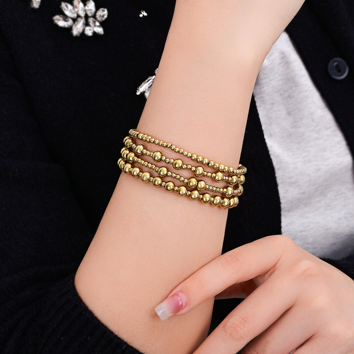 Set di Bracciali Dorati Demure