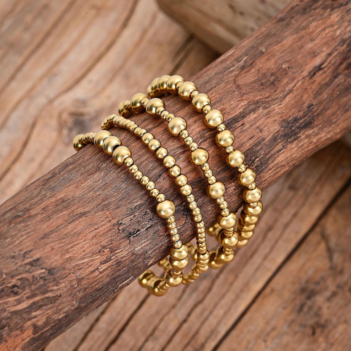 Set di Bracciali Dorati Demure