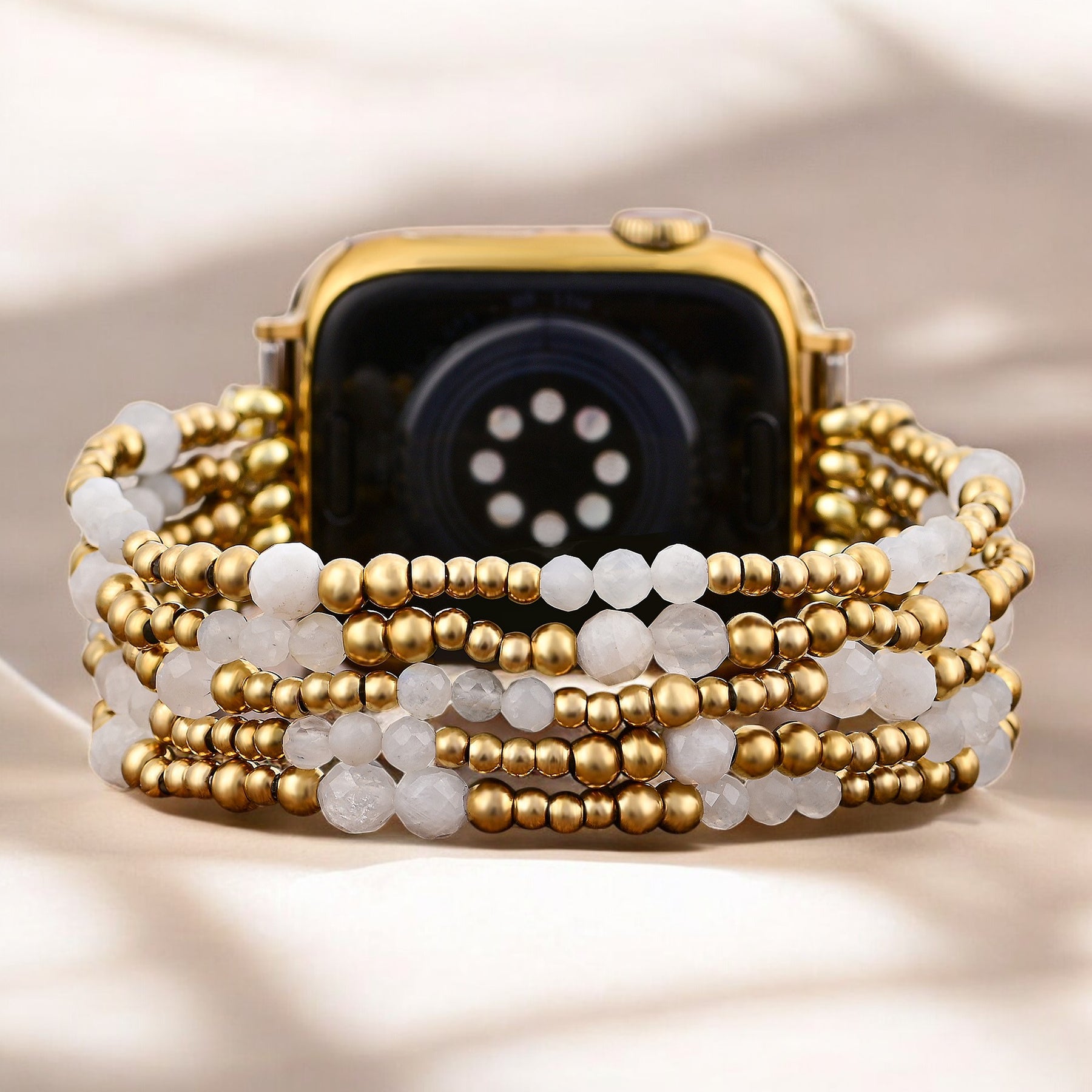 Cinturino elasticizzato Apple Watch in pietra di luna con alone dorato