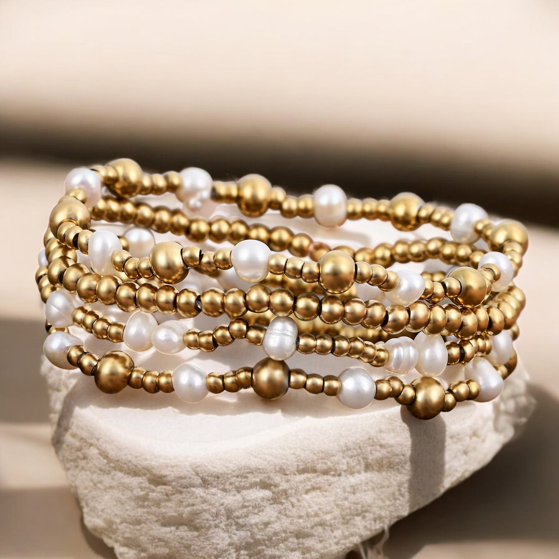Set di Bracciali con Perle Dorate Scintillanti