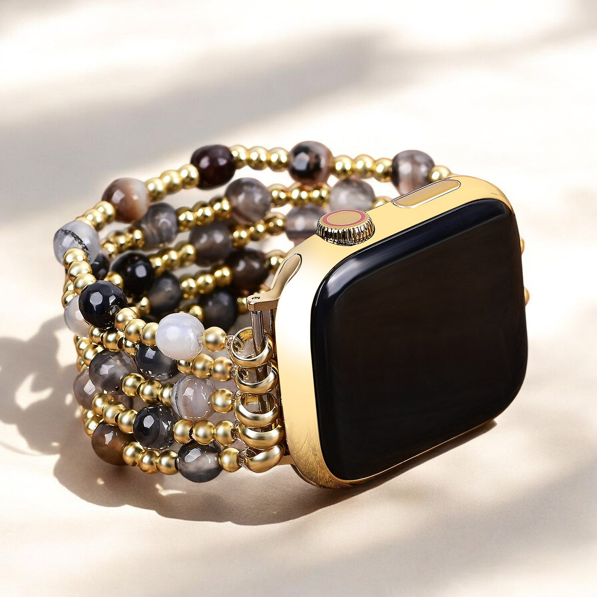 Cinturino elastico per Apple Watch in oro e perla