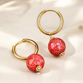 Orecchini a cerchio con sfera maculata Crimson Orbit