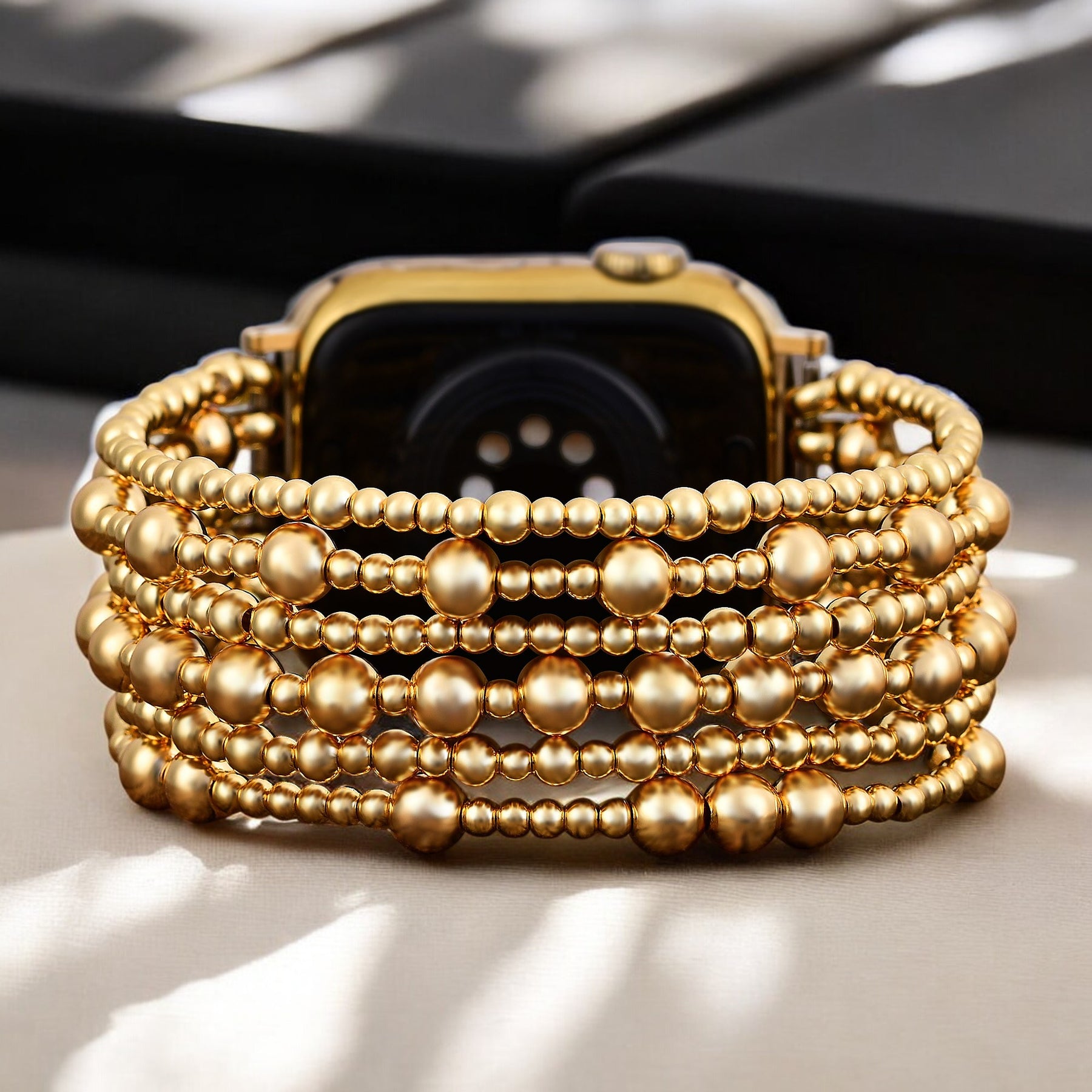 Cinturino elastico Demure dorato per Apple Watch