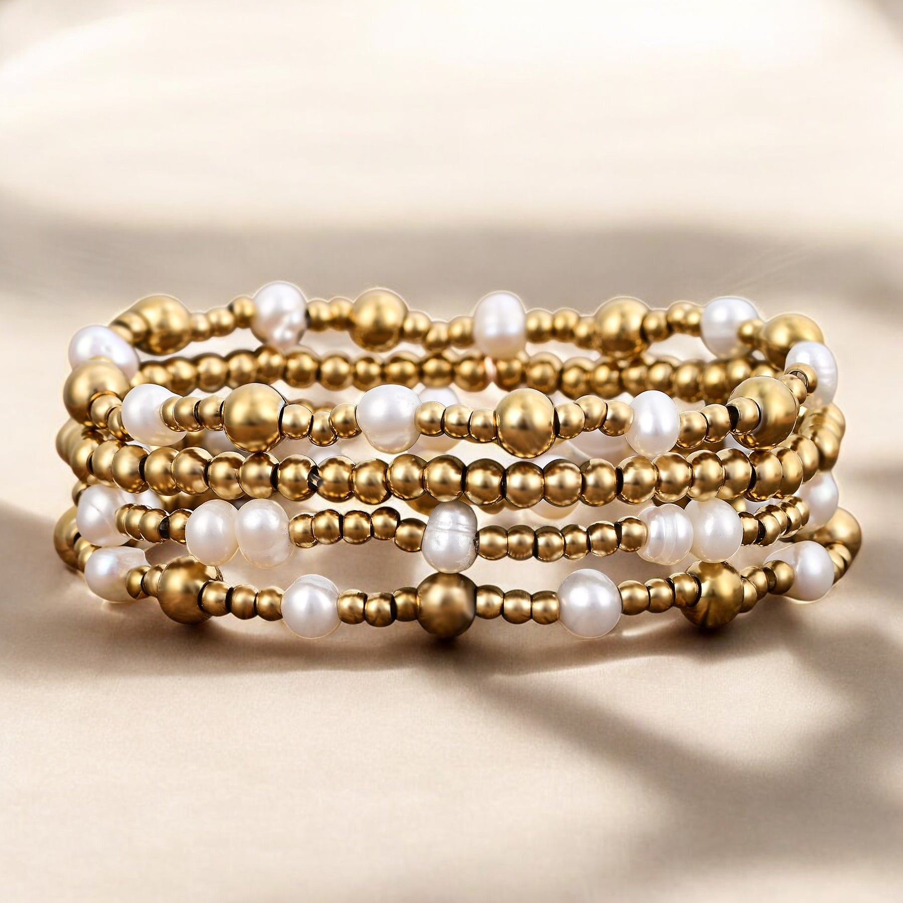 Set di Bracciali con Perle Dorate Scintillanti