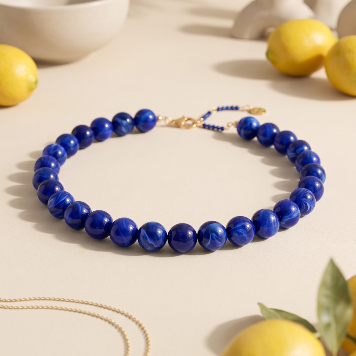 Collana spessa con perline blu