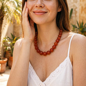 Collana spessa con perline rosse