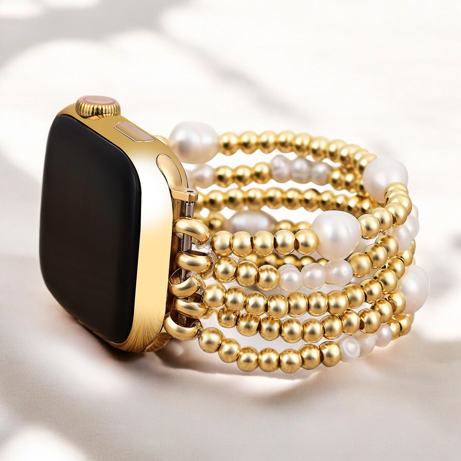 Cinturino elasticizzato Apple Watch in oro e perla