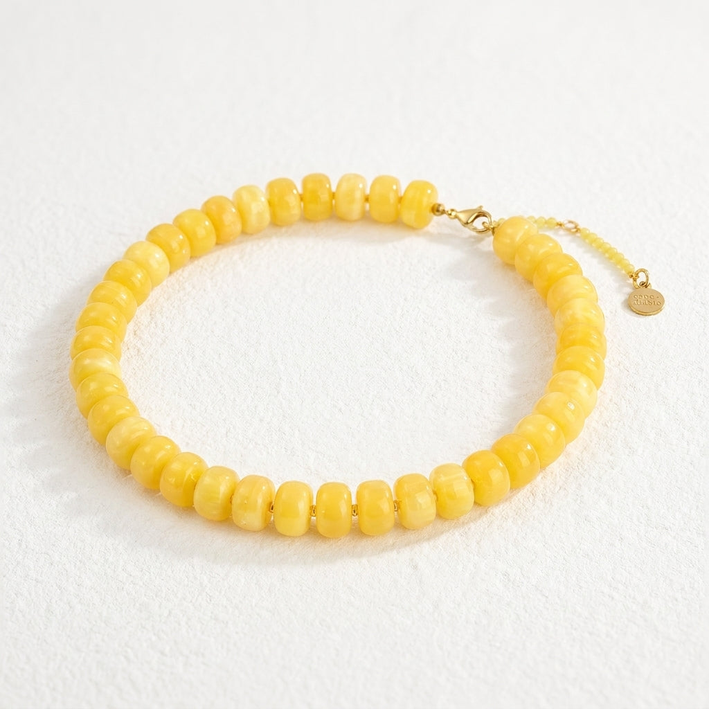 Collana vistosa color miele luminoso