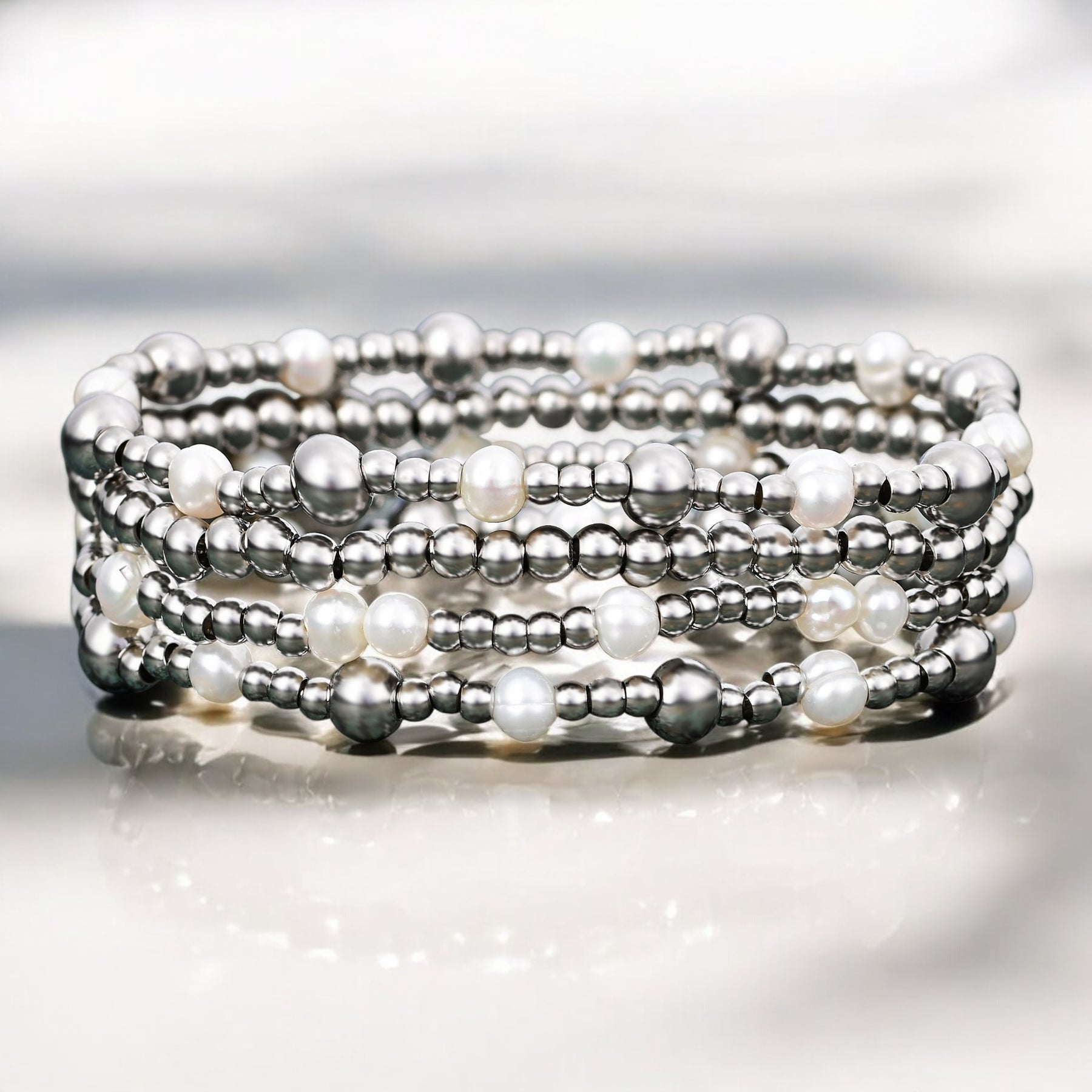 Set di bracciali di perle scintillanti