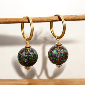 Orecchini a cerchio con sfera maculata Emerald Eclipse