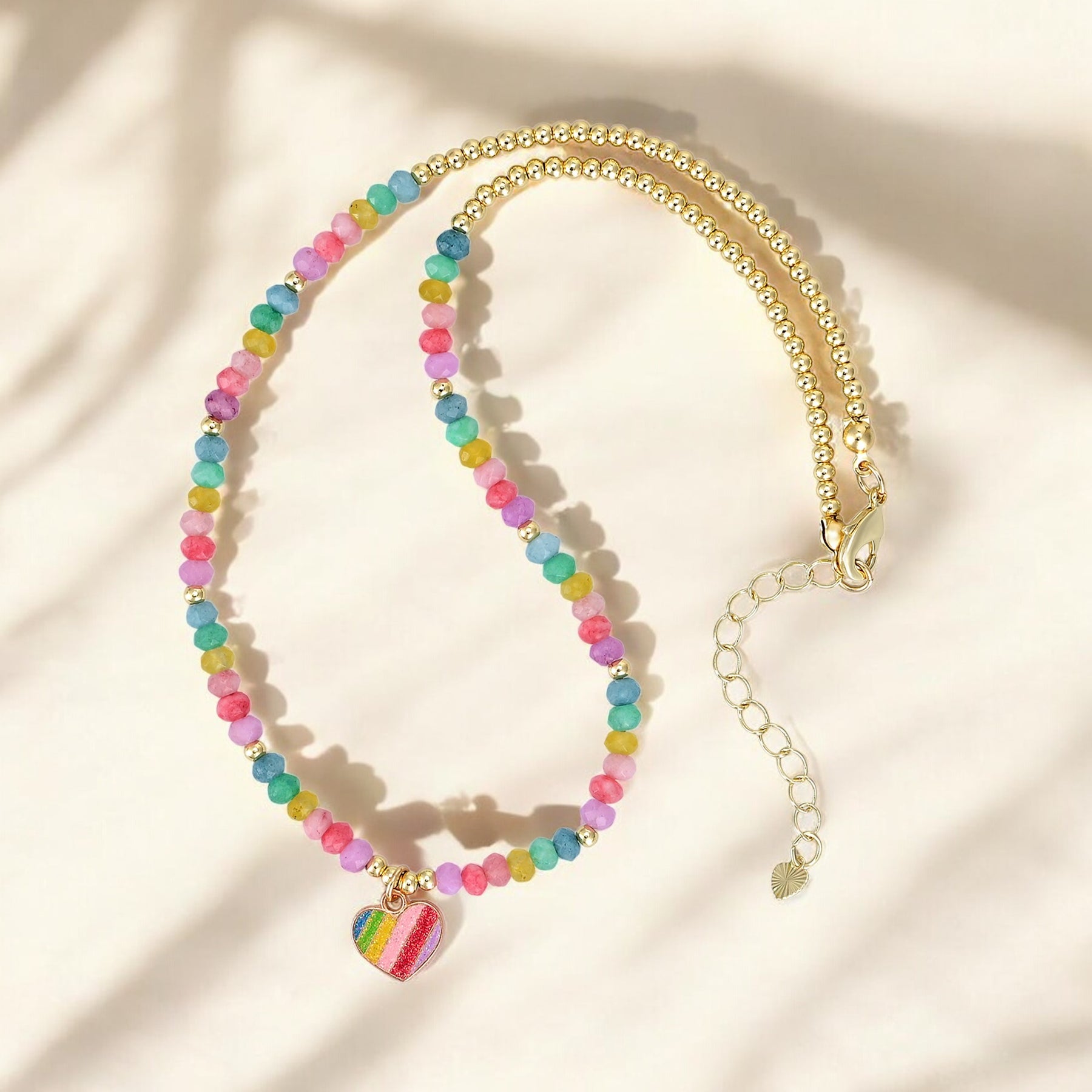 Collana a forma di cuore pastello