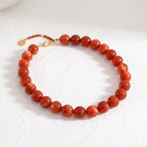 Collana spessa con perline rosse