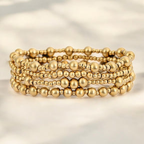 Set di Bracciali Dorati Demure