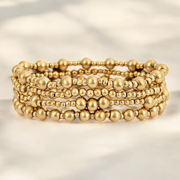Set di Bracciali Dorati Demure