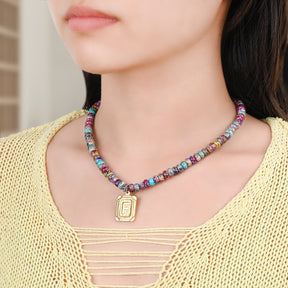 Collana a bolla con iniziale e gemma vivace