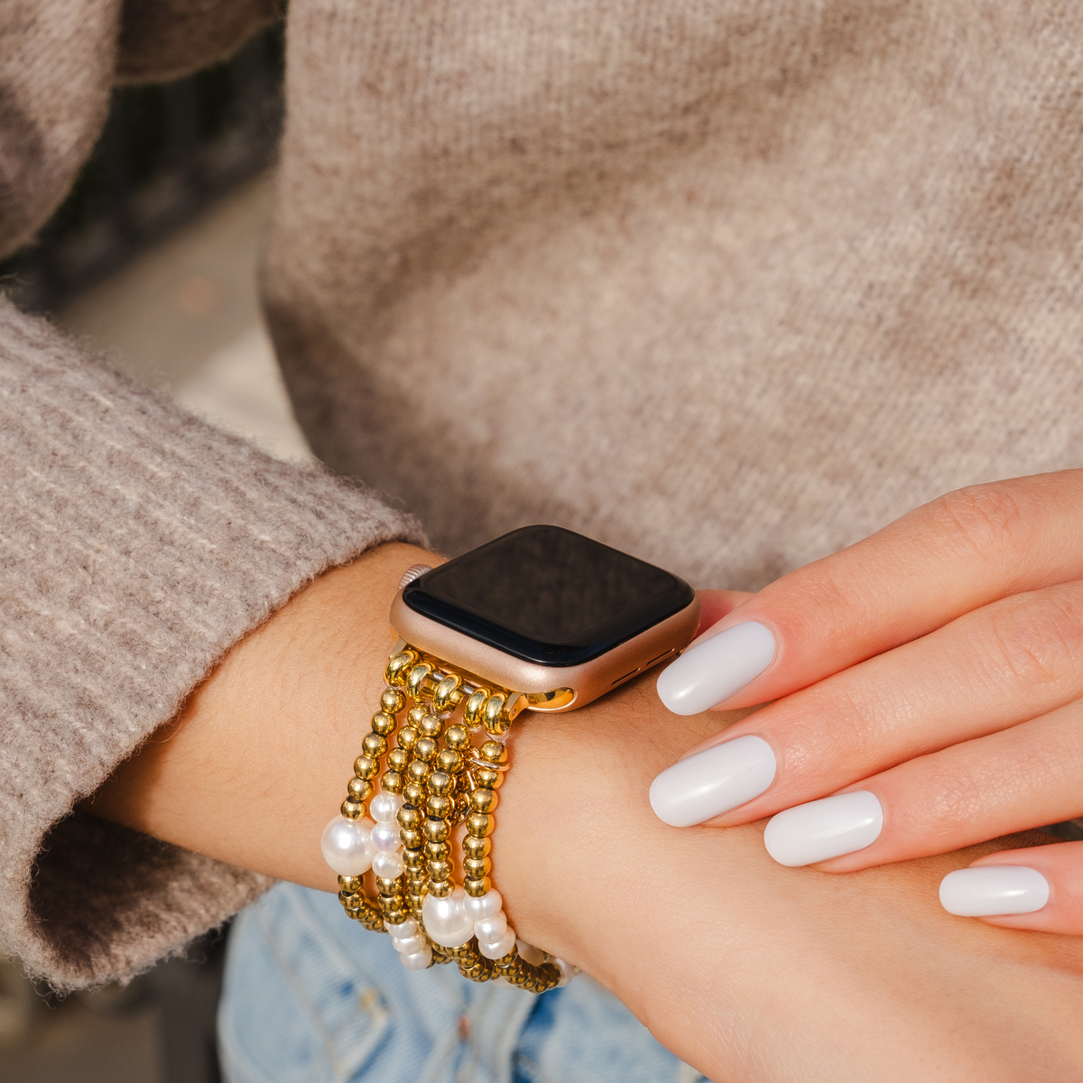 Cinturino elasticizzato Apple Watch in oro e perla