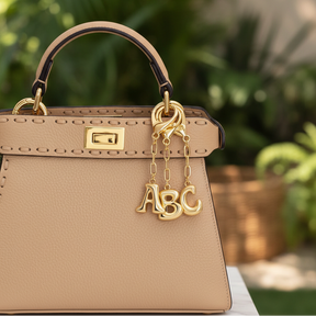 Portachiavi e ciondolo per borsa con lettera iniziale a bolle