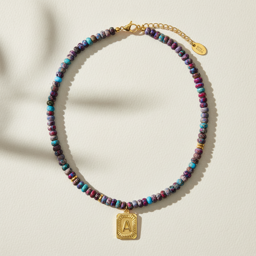 Collana a bolla con iniziale e gemma vivace